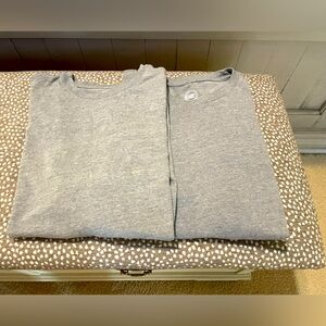Two gray tee shirts. Kids size XL.